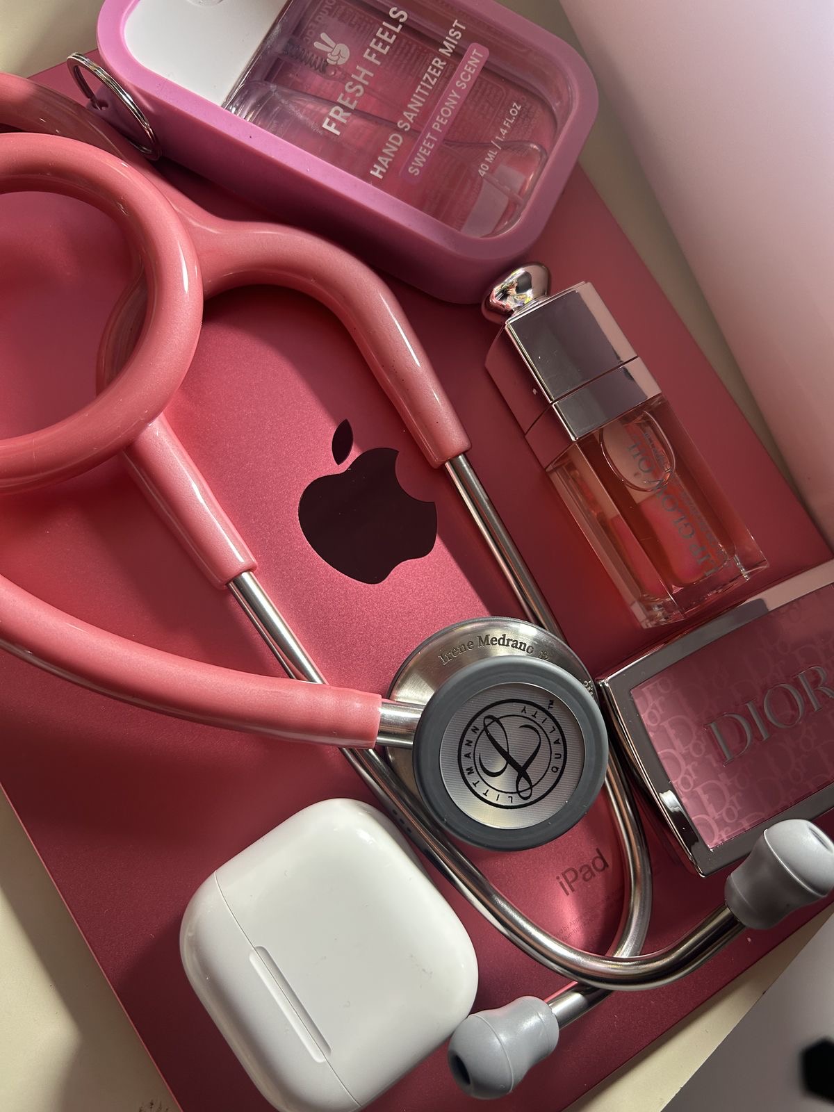 Pink stethoscope with roses — The Shifted Nurse AI business for nurses